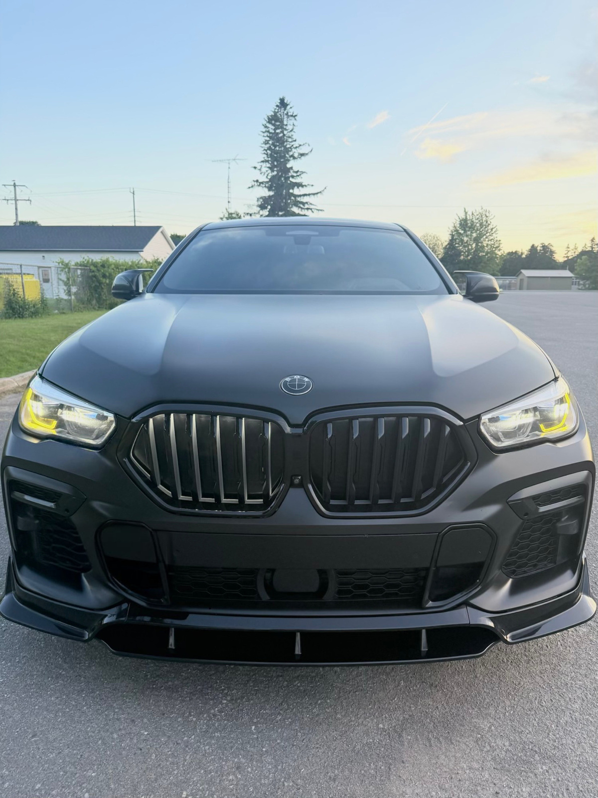Wrapped performance car photographed outdoors