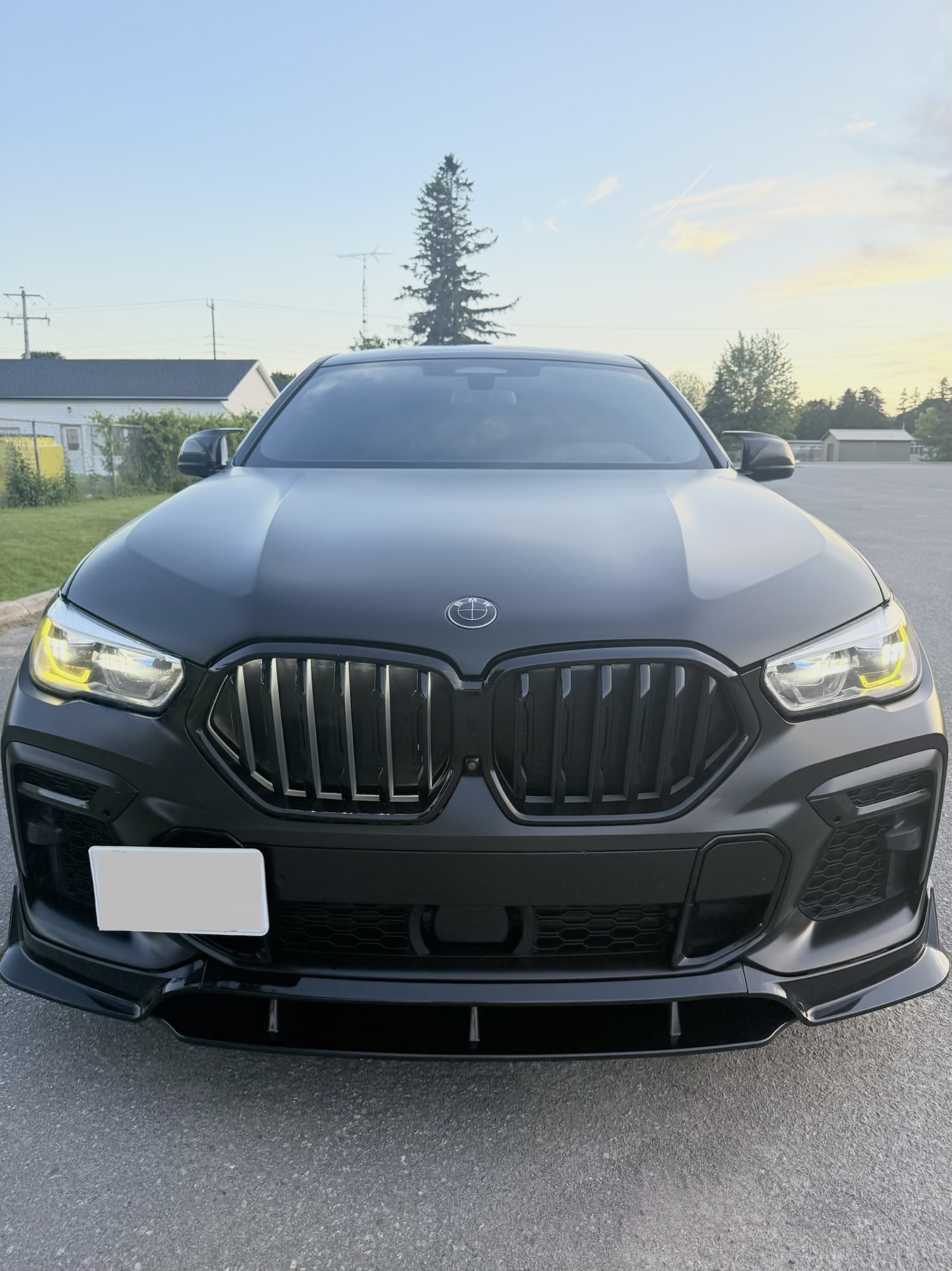 Satin black BMW X6 front view